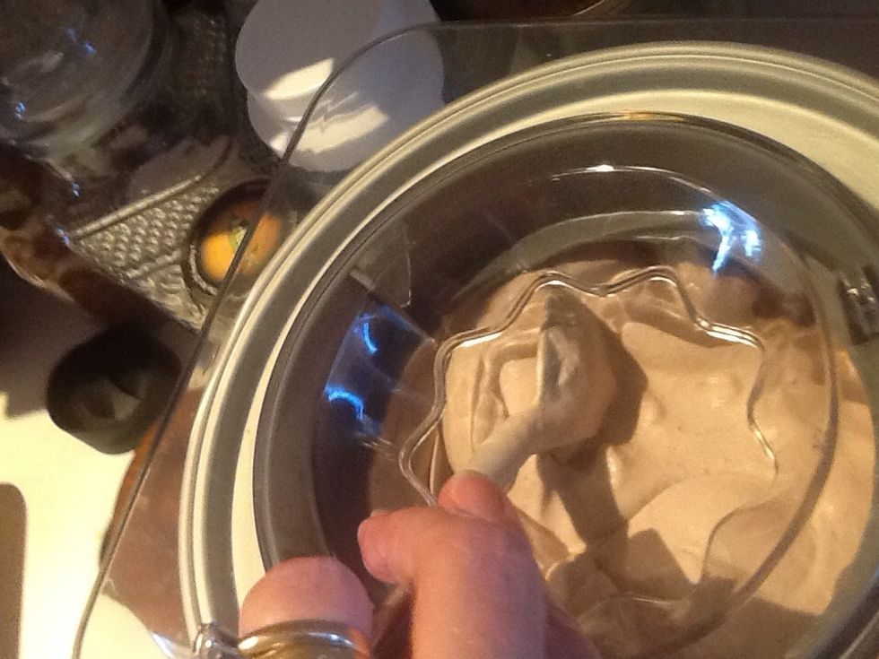 I scrape the bowl down right away and every couple minutes. If you don't, the ice cream freezes to the sides and bottom greater than 1/8". The blades can only do so much.