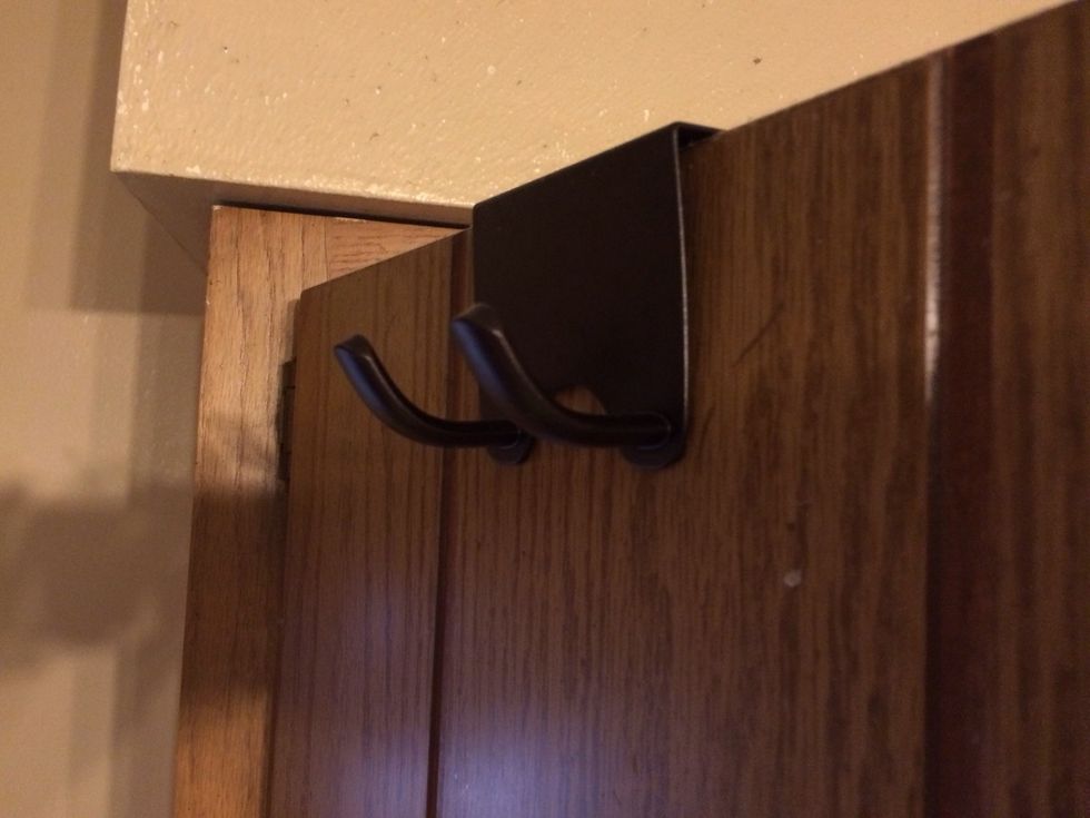 I seen you eyeing my hook. I loove these! It's like the over the door hooks but for cabinets.