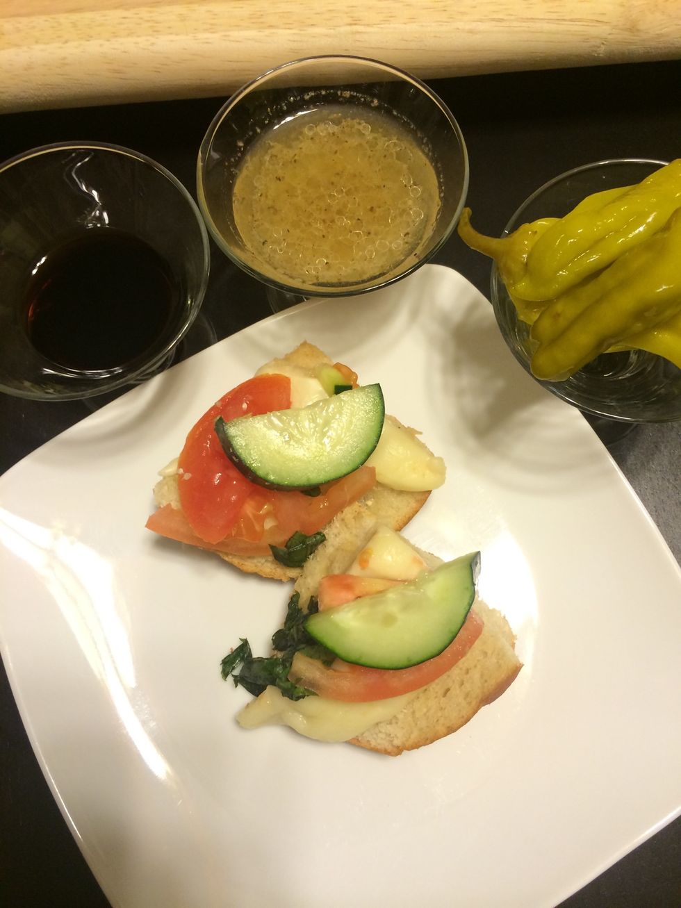I serve it with extra Balsamic Vinegar, pepperoncini's, and oil and vinegar dressing