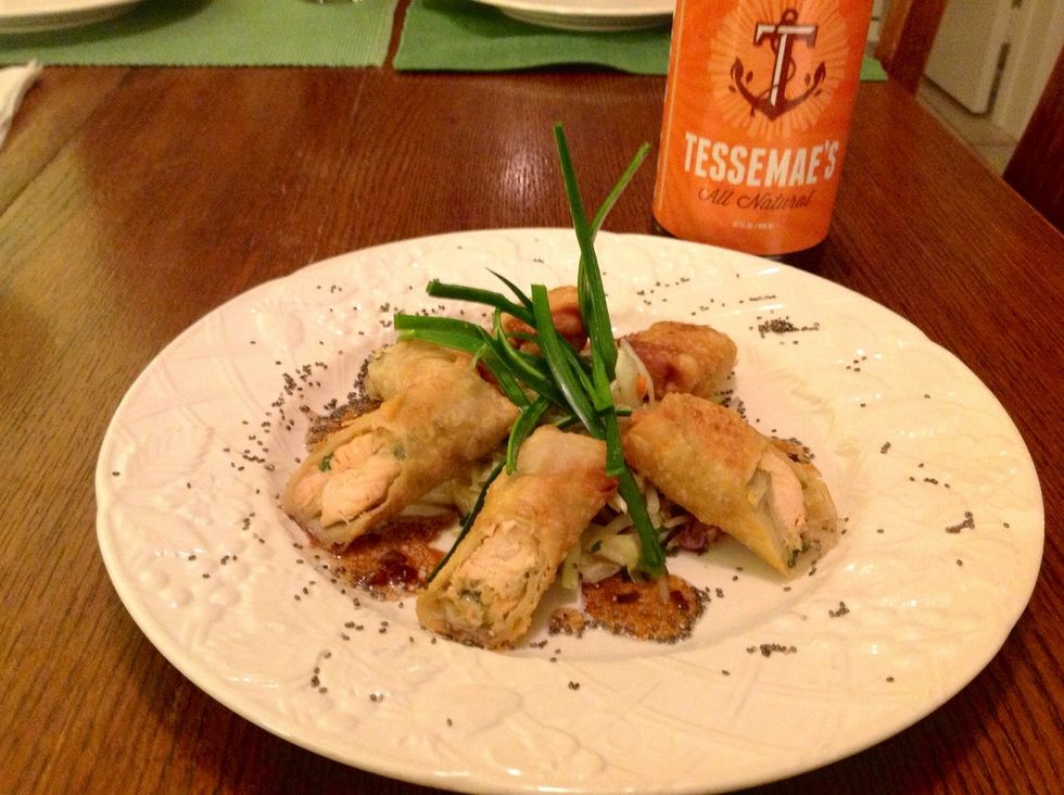 I served egg rolls on top of a shredded slaw mix that I tossed with Tessemae's Soy Ginger. Then drizzled the sauce I made while rolls were frying and garnished with Julian style leeks and sesame seeds