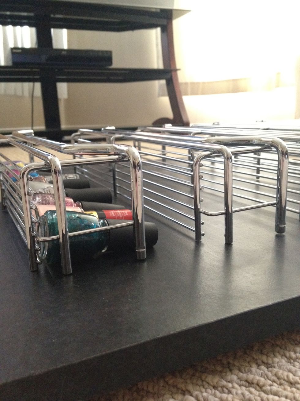 I set the racks down to get a rough visual of what I was doing.  I wanted to make sure the different sized polish bottles would fit.
