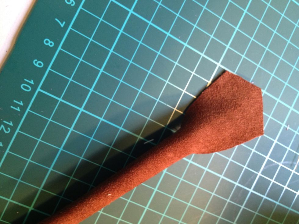 I sewed the sides together forming a tube and left the end bit unfolded to be sewed on to the tote.