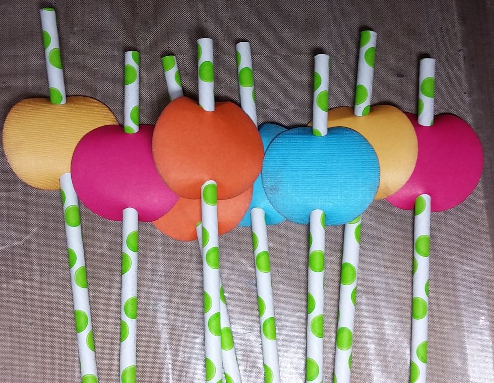 I slid each of the circles into the paper straws (bought a Michaels).
