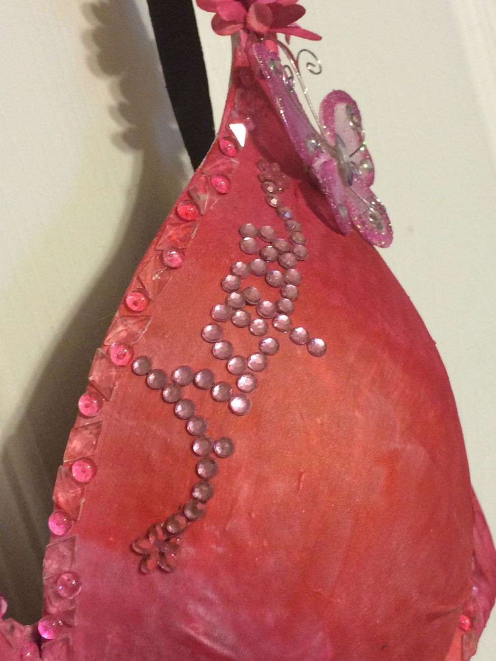 I spelled out 'hope' with pink rhinestones onto the upper part of the left cup.