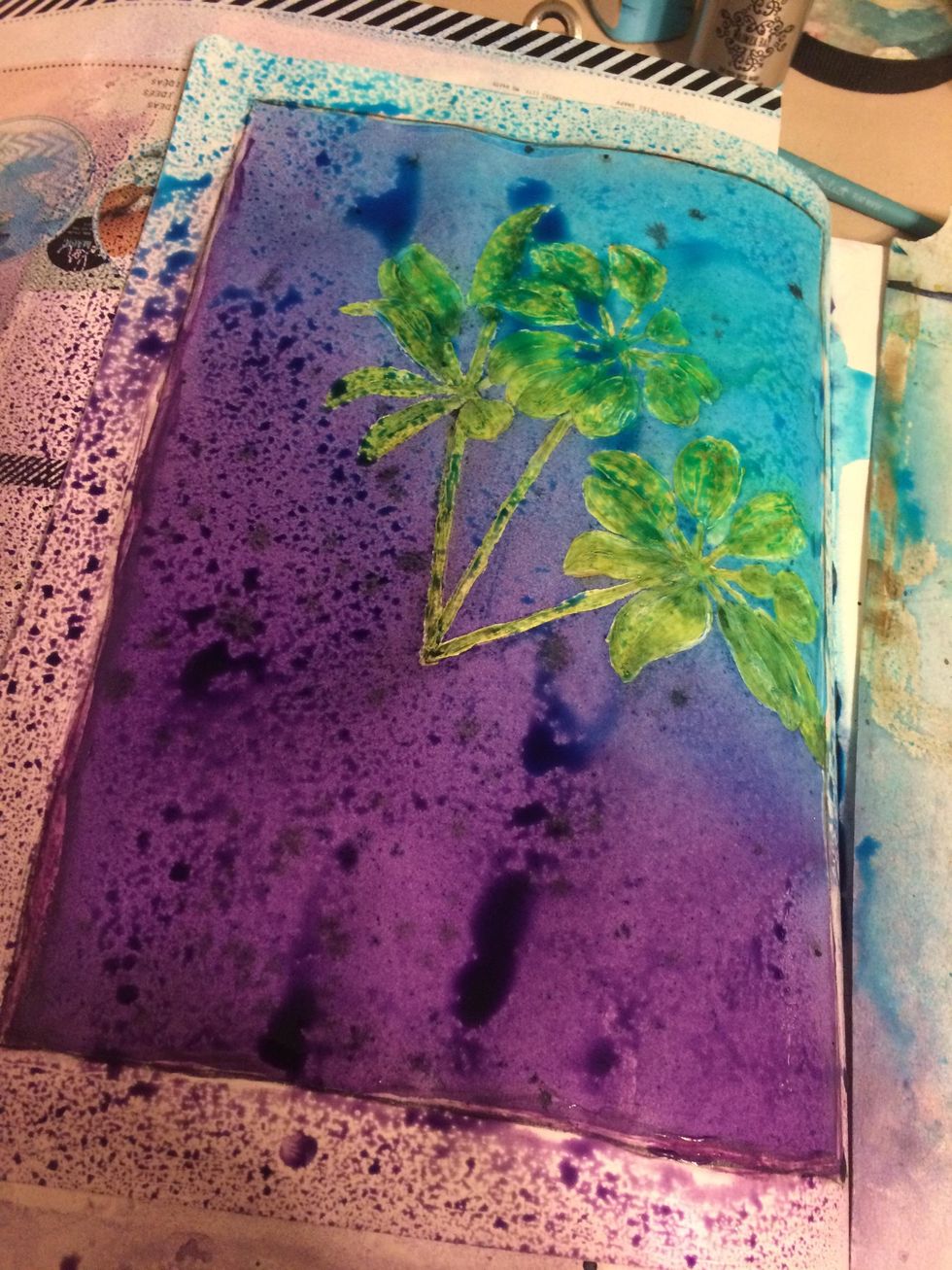 I sprayed Concord Colorations on the lower portion of the page and Waimea Bay on the upper portion of the page, having them blend where they meet.