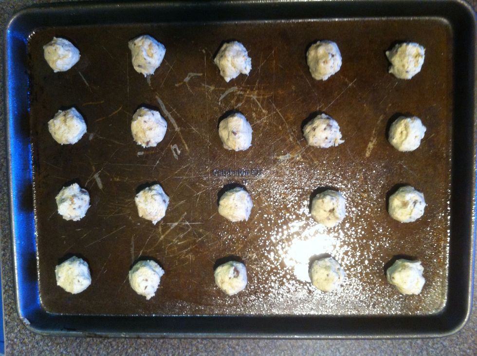 I sprayed cooking spray on my pan so the cookies wouldnt stick. Teaspoon sized cookie balls \u270c I was able to fit 20 on my pan. Now place in the oven (350 degrees Fahrenheit) for 10-12 minutes.