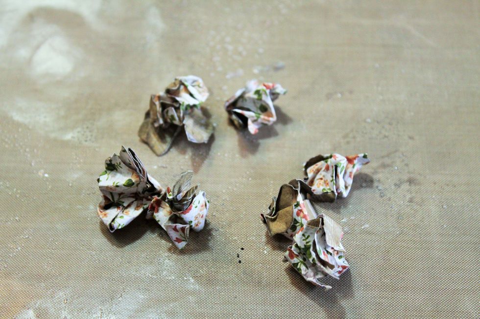 I spritzed the flowers with Smooch in a pearl color just to wet them enough that they would crinkle up without tearing.