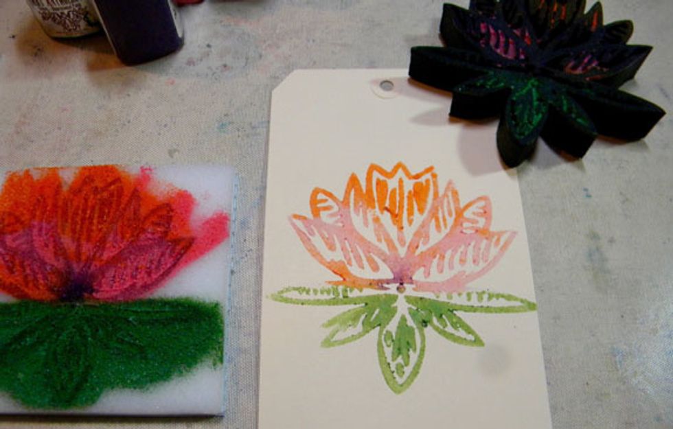 I stamped 6 water lilies with one application of paint to the Stamp Buddy! I cut out one of the water lilies and mounted it on top of the tag using foam tape for a 3D effect.