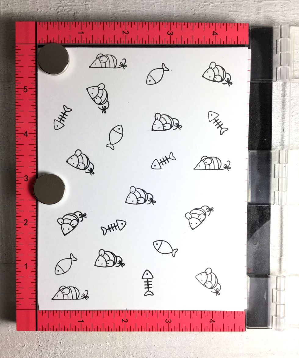 I stamped the background with the little toy mice, little fish and fish bones from the stamp set. And using the Misty made it easy.