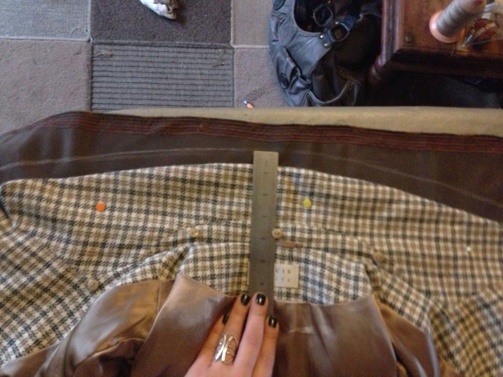 I start by laying the jacket collar onto the velvet and drawing around the top curve leaving +1/2 " seem allowance.then I measure down to the top of the lining .this will be more than you need .