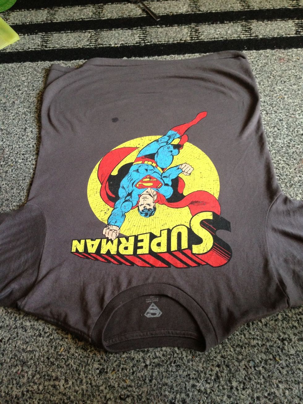 I start off with the shirt upside down. Easier to cut that way!