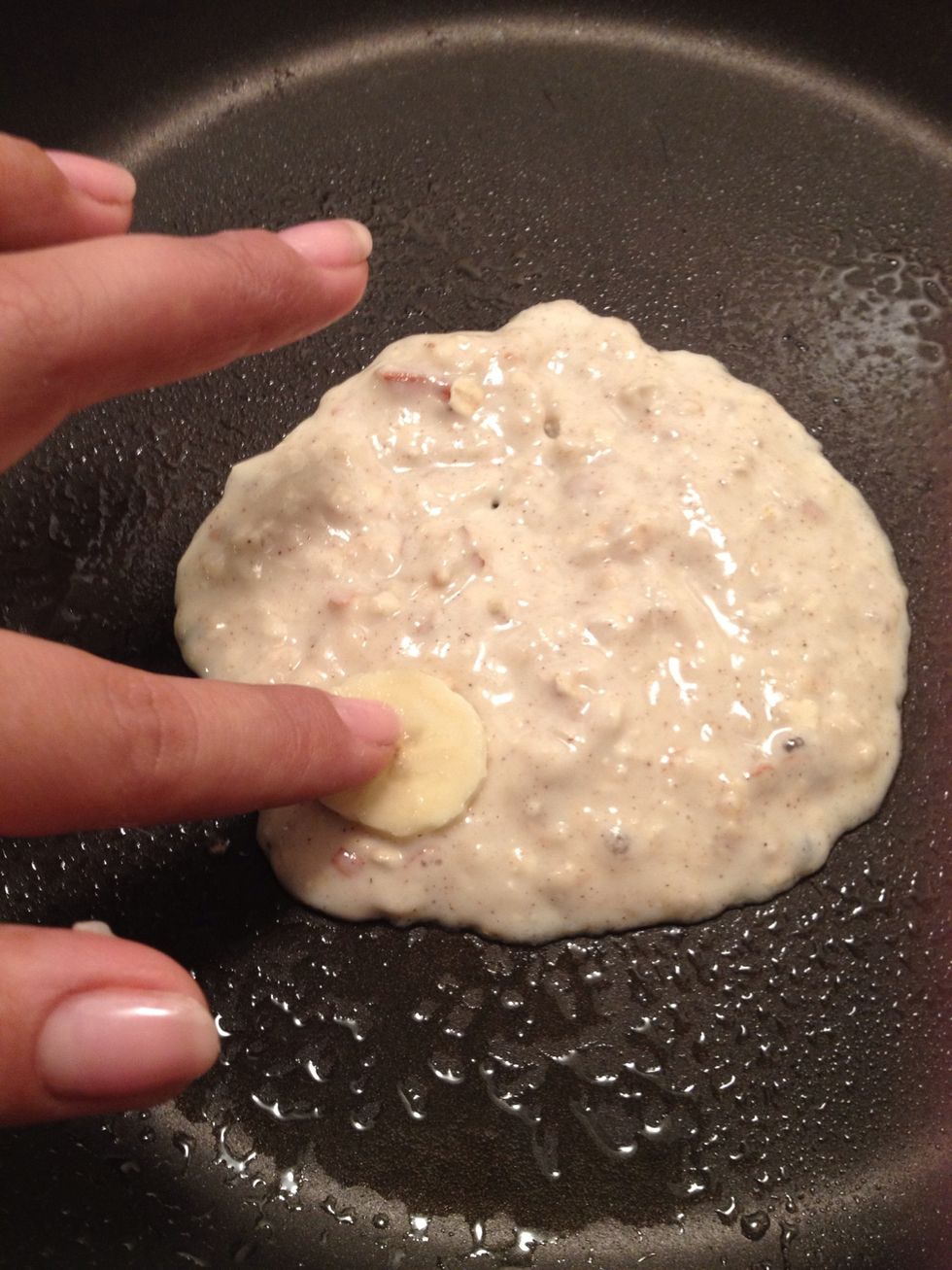 I start with bananas and press down into batter...