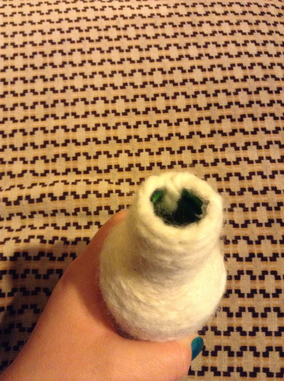 I started at the bottom and twirled my way up and glued the end of the string down.