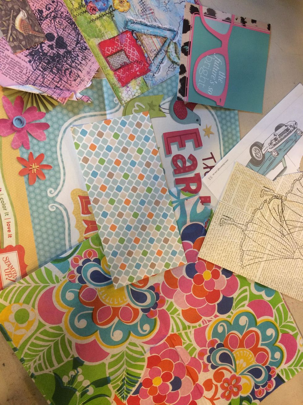 I started by gathering some favorite collaging papers from my stash. I picked a combination where the colors worked well together.