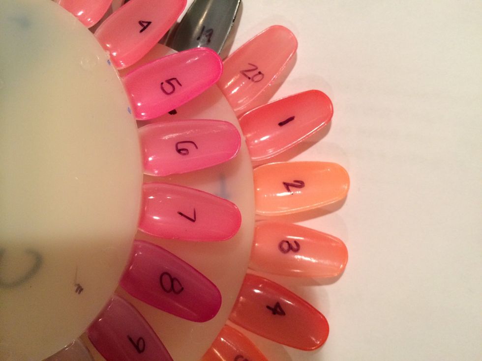I started by numbering the backs 1-20. I then started swatching. I found you could swatch about 3-4 at a time without getting polish every where.