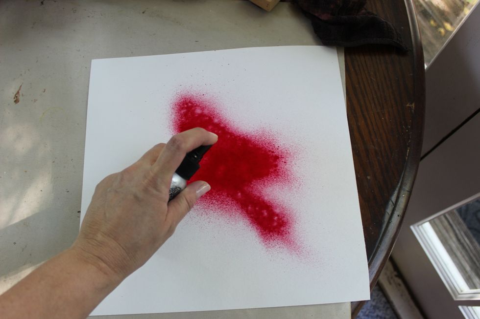 I started by spraying the center of the paper with our new fabulous Colorations color, Valentine. I sprayed a lot. Spray and puddle it.