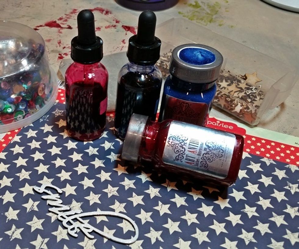 I started gathering supplies....as you can see this is a very patriotic mix! Also I was inspired by the sketch challenge over at More than Words.... so with out further ado lets get started!