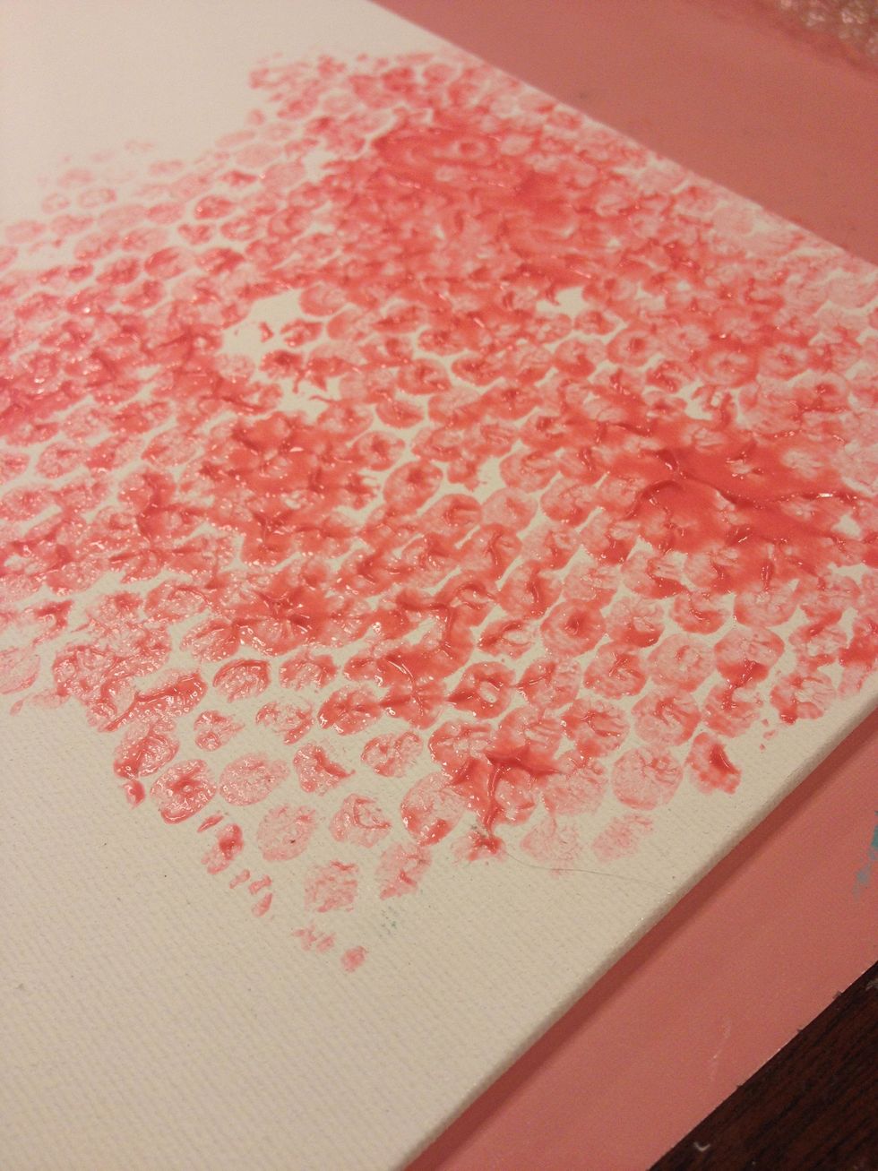 I started out by stamping Persimmon Velvet with bubble wrap onto my canvas.