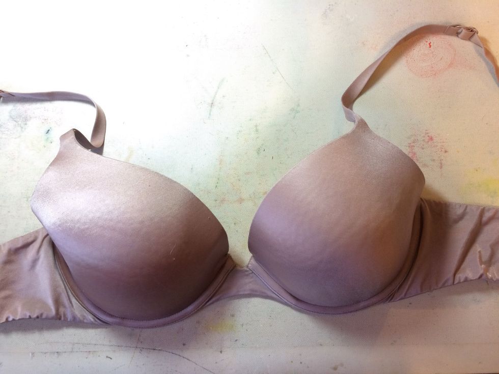 I started with a lovely Victoria's Secret bra (lol). I spread it across my Art Anthology Craft Mat.