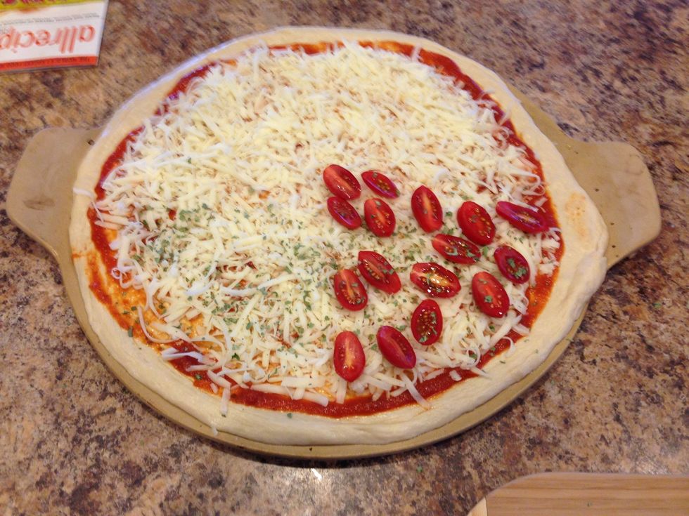 I started with grape tomatoes cut in half and basil. We have very different tastes in my house so I made a speciality quarter pizza for each of us.