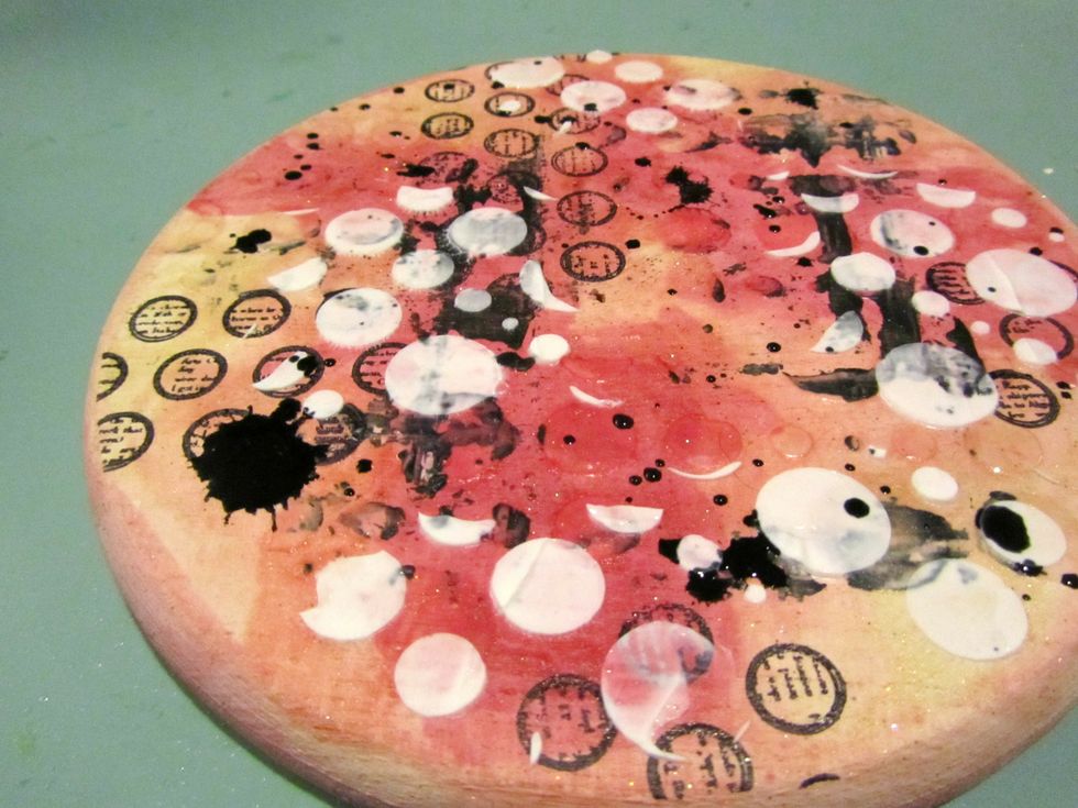 I stencil with modeling paste and splatter Art Anthology Colorations Raider.