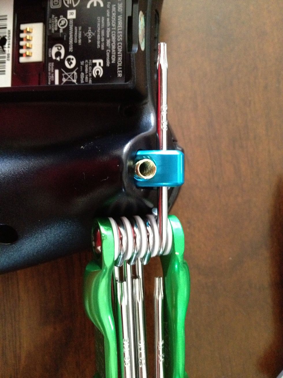 I stuck this through the side of the trigger to assist me in getting the set screw in. Took some serious concentration to keep my set screw from being launched by my springs.