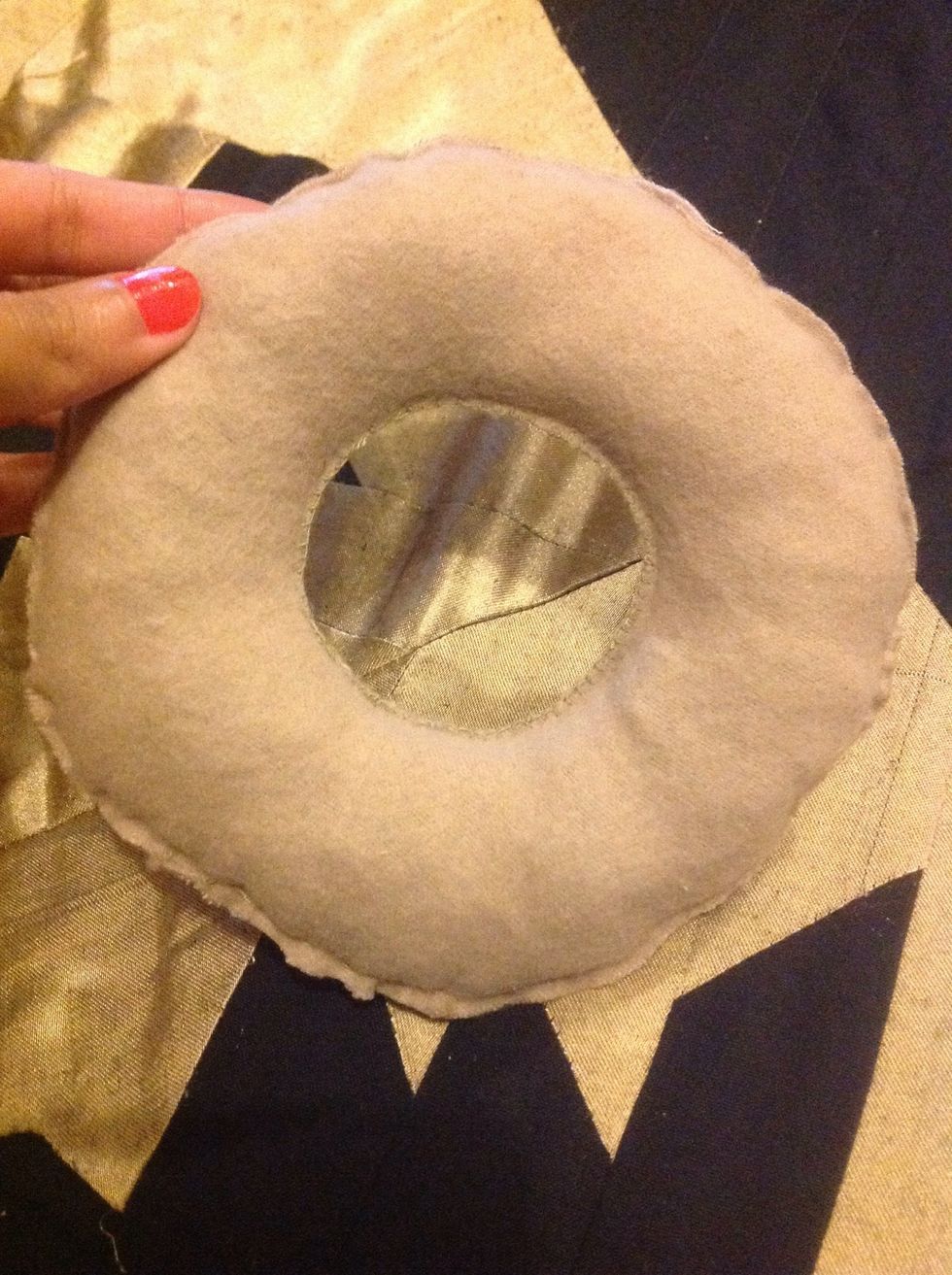 I stuffed it with a little cotton and a few rags. And my glue was opening a little so I stitched it up as you can see in the smaller circle,