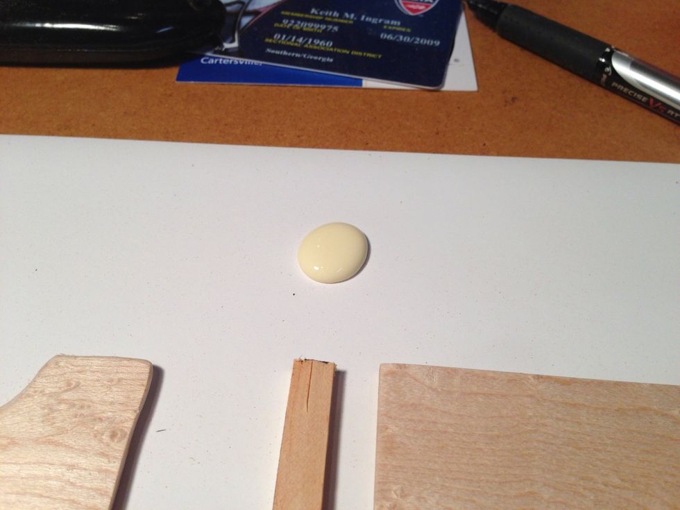 I suggest a dot of glue on paper and spread with your finger. Don't over glue it can't be sloppy on the inside where the cards will stay or they will bind.