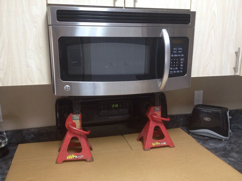 I supported the microwave with some jackstands