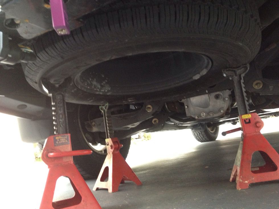 I supported the tire with some jack stands