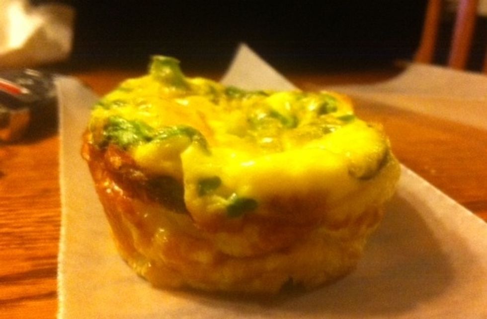 I take a spoon to help ease your quiche out of the muffin cup. Here is your finished product. YUM!!