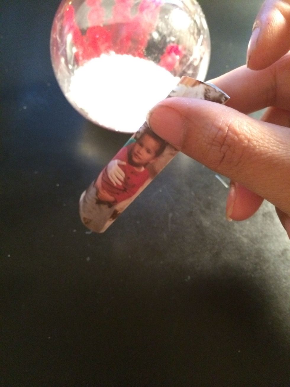 I than rolled up the pic and inserted it in the ornament and adjusted it with my fingers.