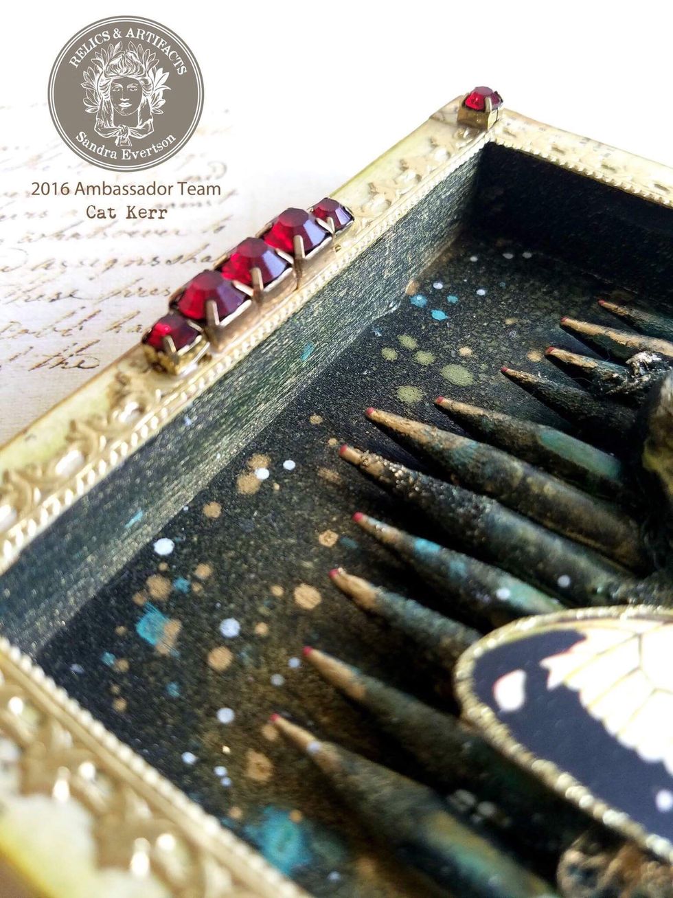 I then added Gold Metallic Lustre to the raised parts