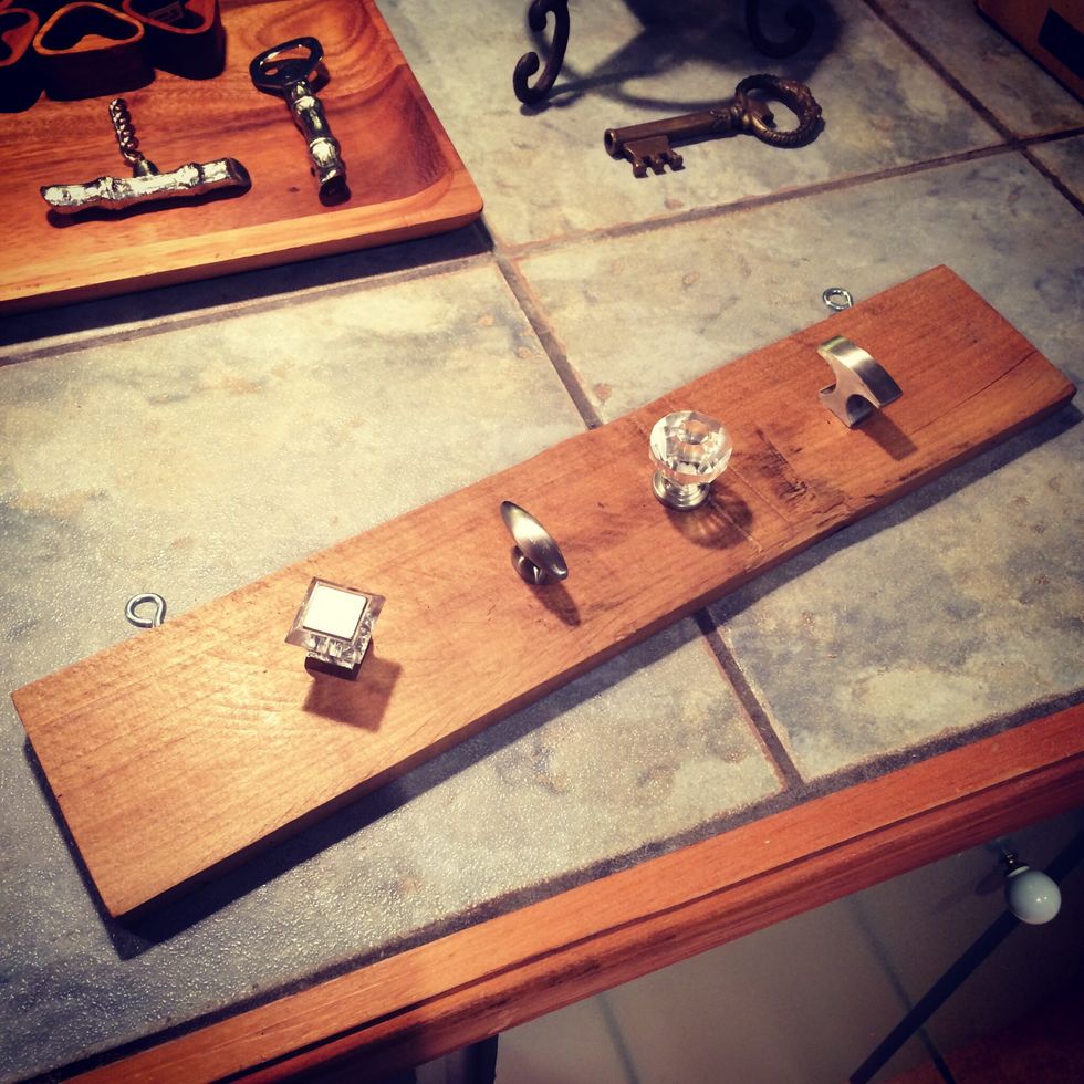 I then added tung oil to the wood which is optional. Now you screw in the drawer pulls.