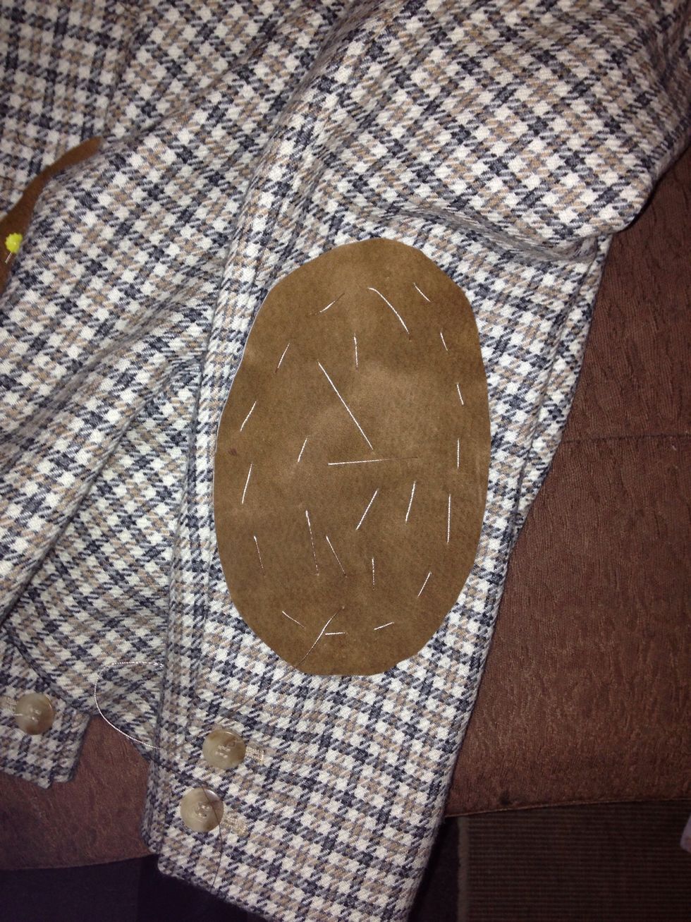 I then basted the patch in place using big stitches and a fine needle. The thread I used although slightly thicker, it's silky and goes through the suede beautifully.