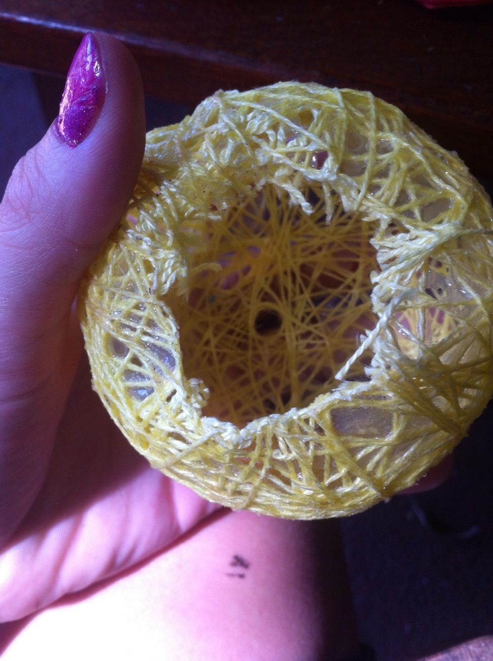 I then cut out a hole from the bottom with scissors