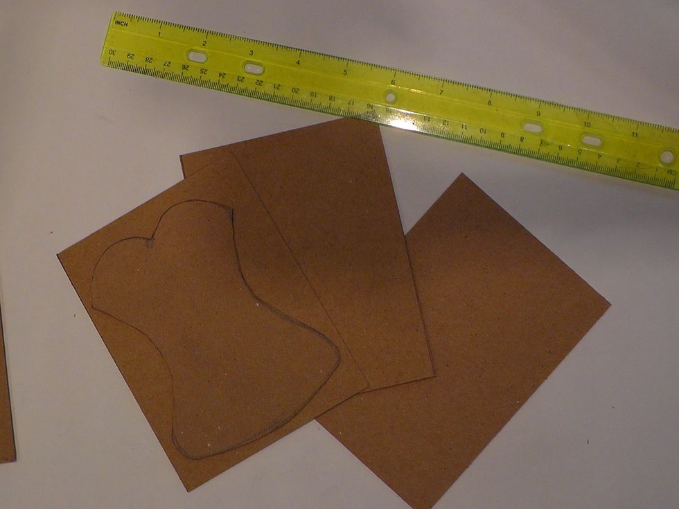 I then cut out my chipboard to a little bigger than my template. Did you know cereal boxes are a great source of chipboard?