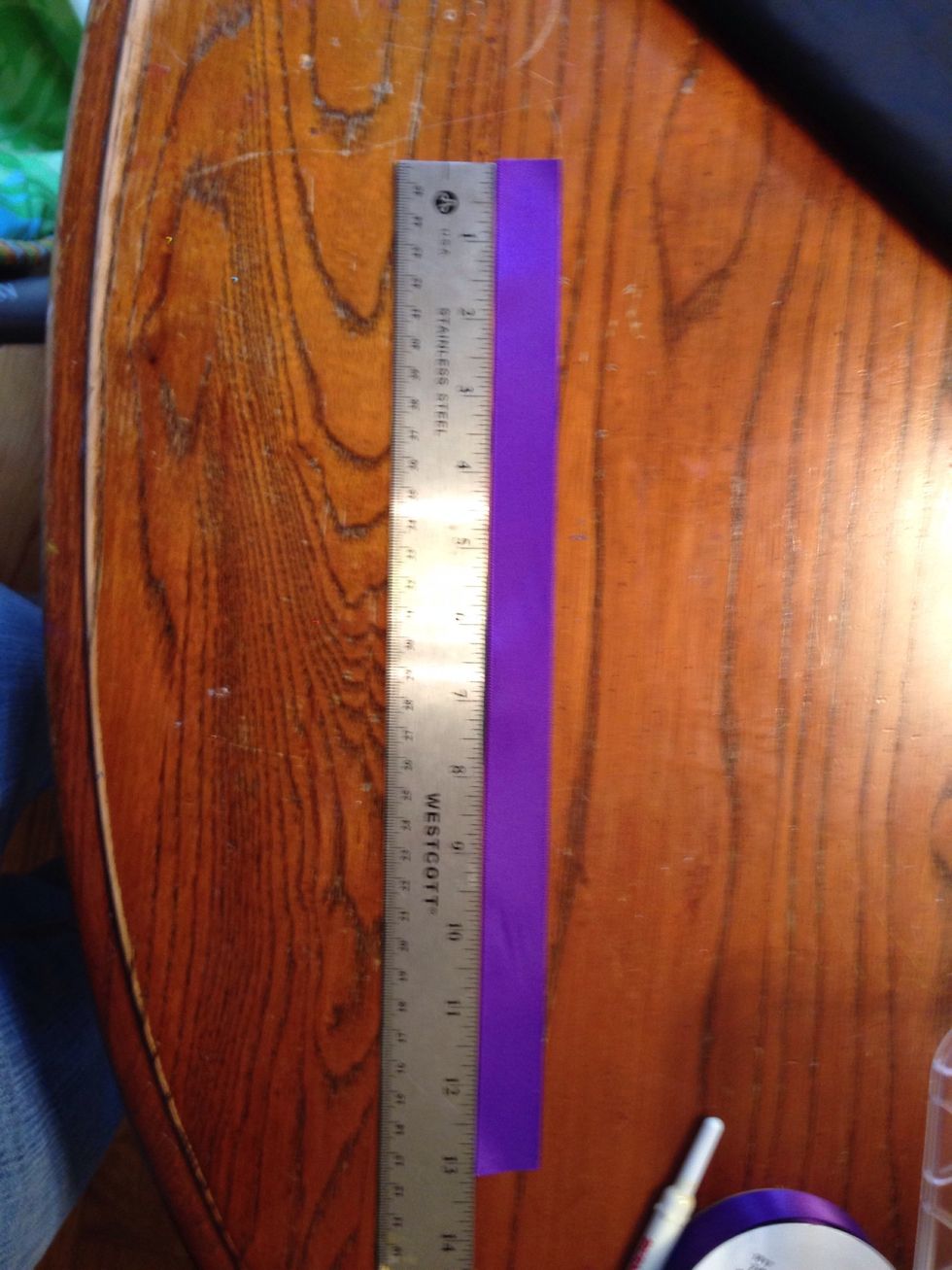 I then cut the ribbon a couple of inches bigger then her neck measurement.
