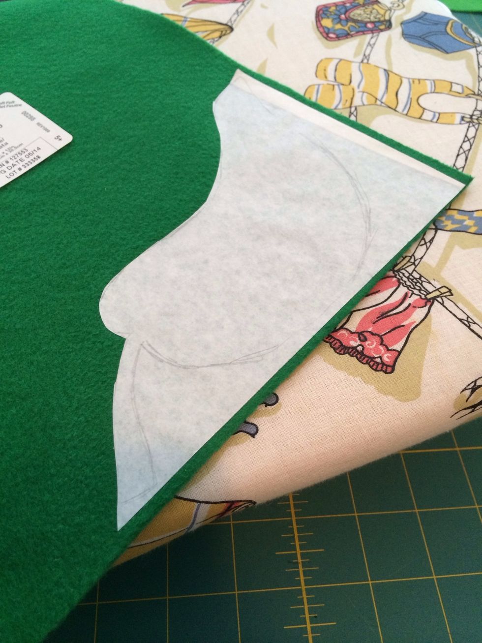 I then glued this to the felt I wanted to use. If you're making something to wear often (and thus wash and dry a lot) I wouldn't advise felt... Use fabric instead.