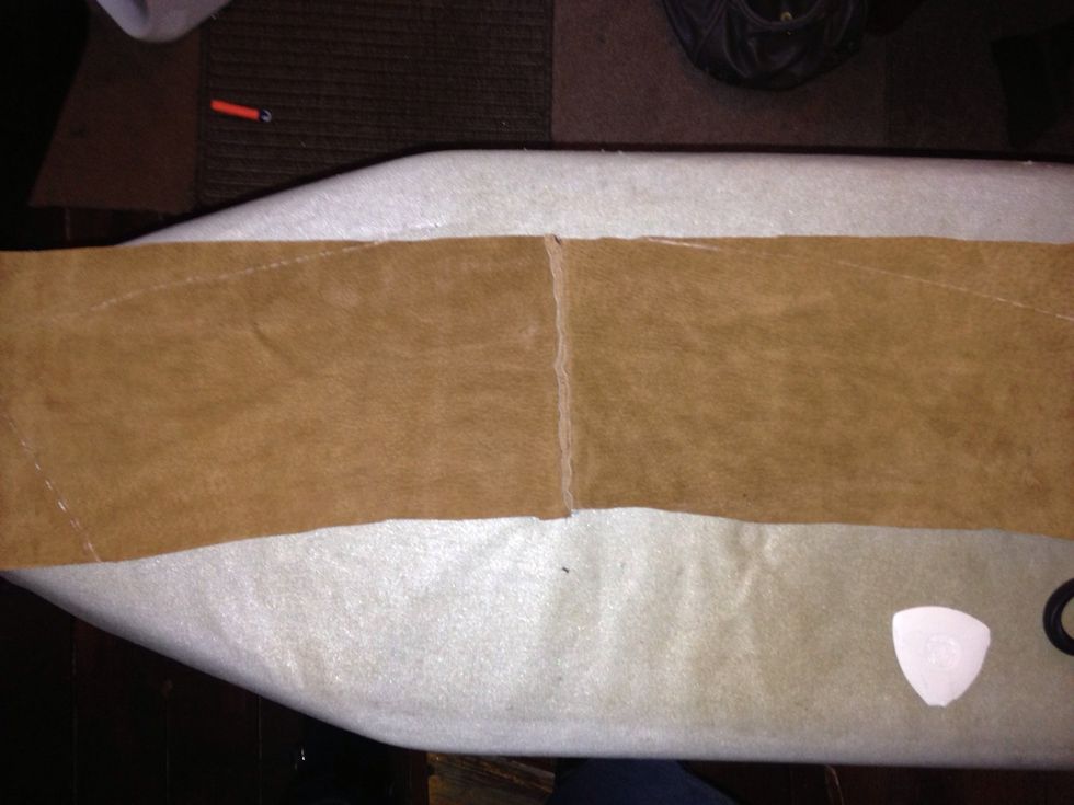 I then placed the suade seem up onto a flat surface and traced around the velvet side of the collar then cut it out.