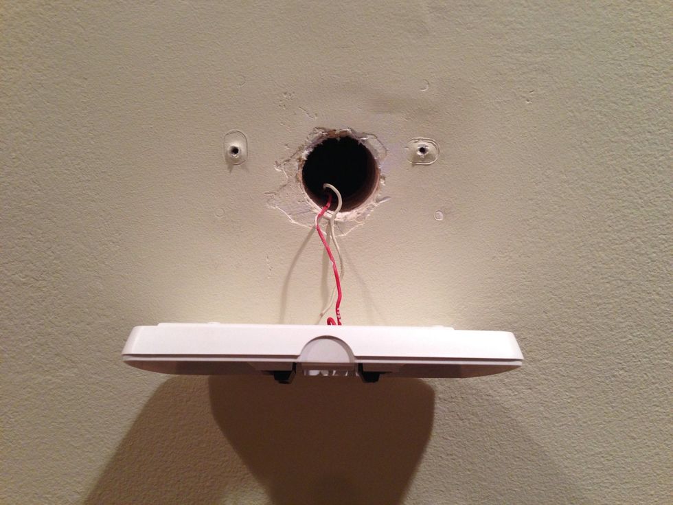 I then removed the thermostat from the wall. Dang, I have a few holes I don't feel like patching and painting, guess this means I'll be using the included trim plate (which is optional to install.)