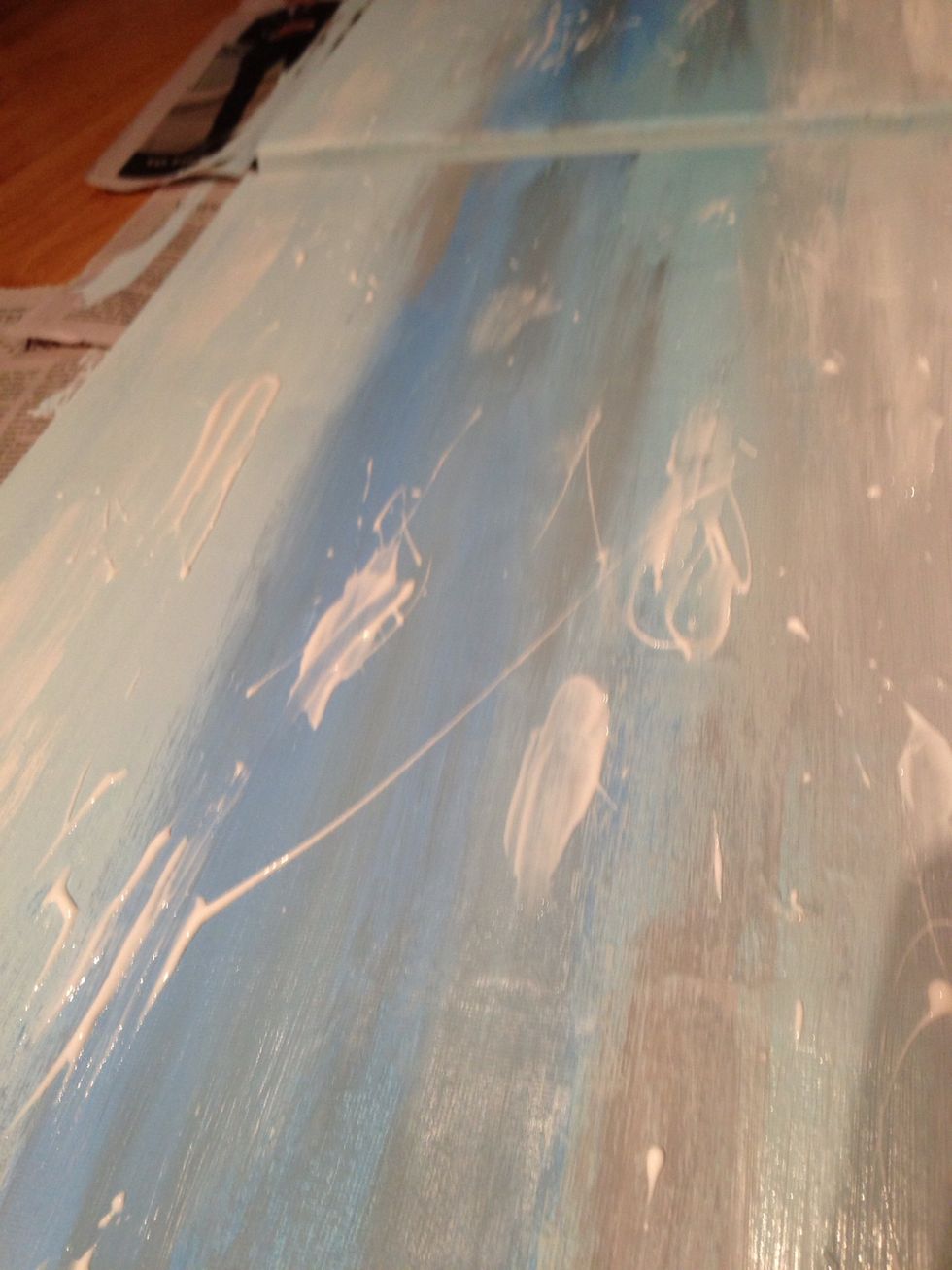 I then slathered the whole canvas in clear Mod Podge in order to seal it. This was splattered on and dried clear.