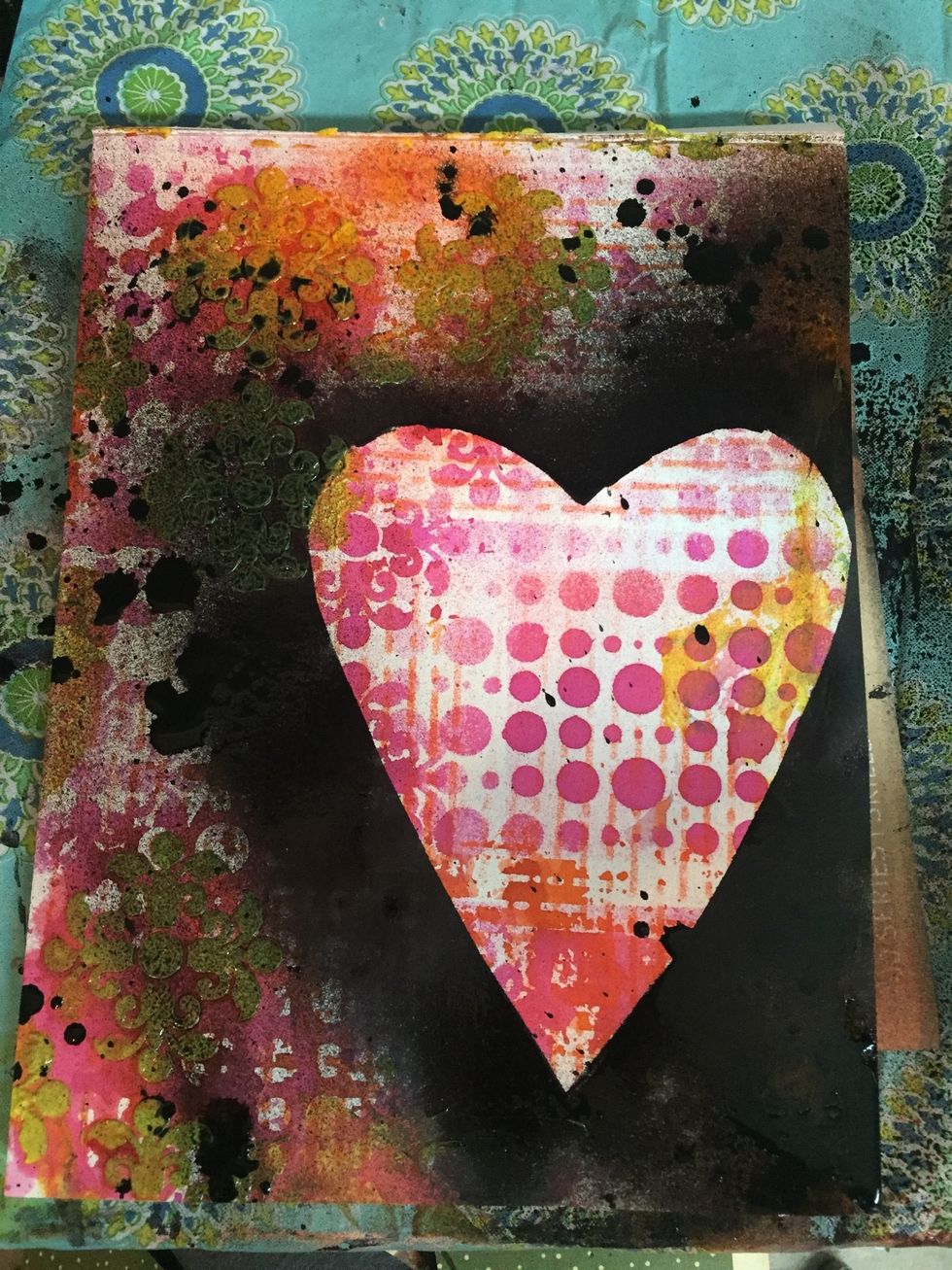 I then sprayed Art Anthology's Colorations Spray in Radar over the heart mask. I also let some drips splatter on to page.