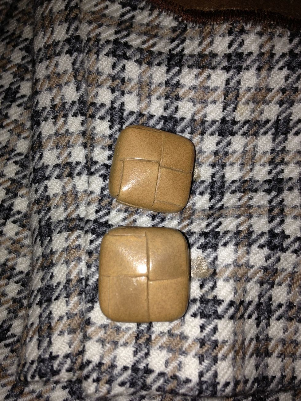 I then thrifted some chunky leather bound buttons. This jacket has non working cuffs and decorative buttons so I could use bigger than the originals, they didn't have to go through the buttonholes.