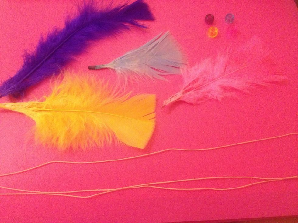 I then took more string and some beads and feathers.