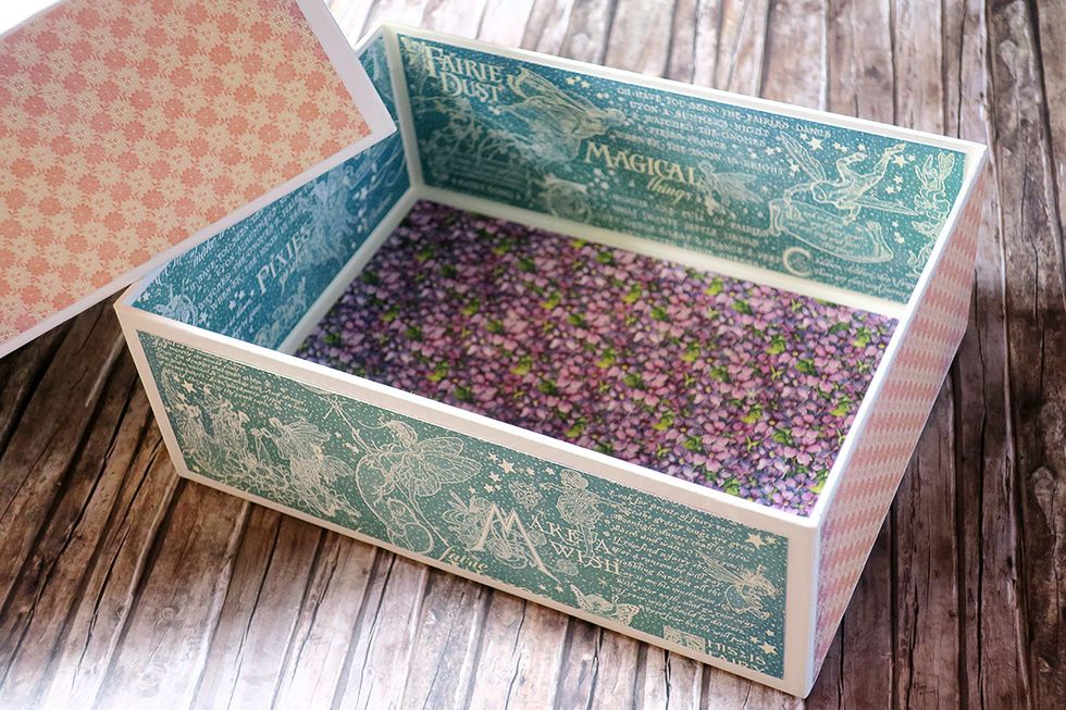 I think it looks better with paper on the outside too. Embellish with paper the matchbook "shell" as well.