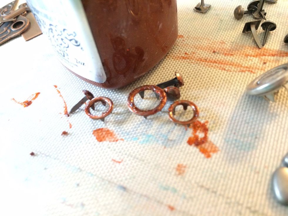 I thought it looked a tad plain, so I added some metal embellishments to it after I painted them with Kenyan Copper Sorbet to match.