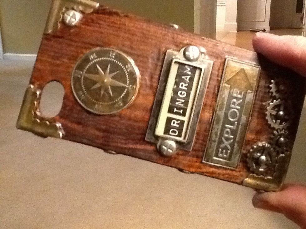 I thought the compass rose was clever but I was really proud of adding the name in rustic typewriter type font. The gears make it look really interesting.