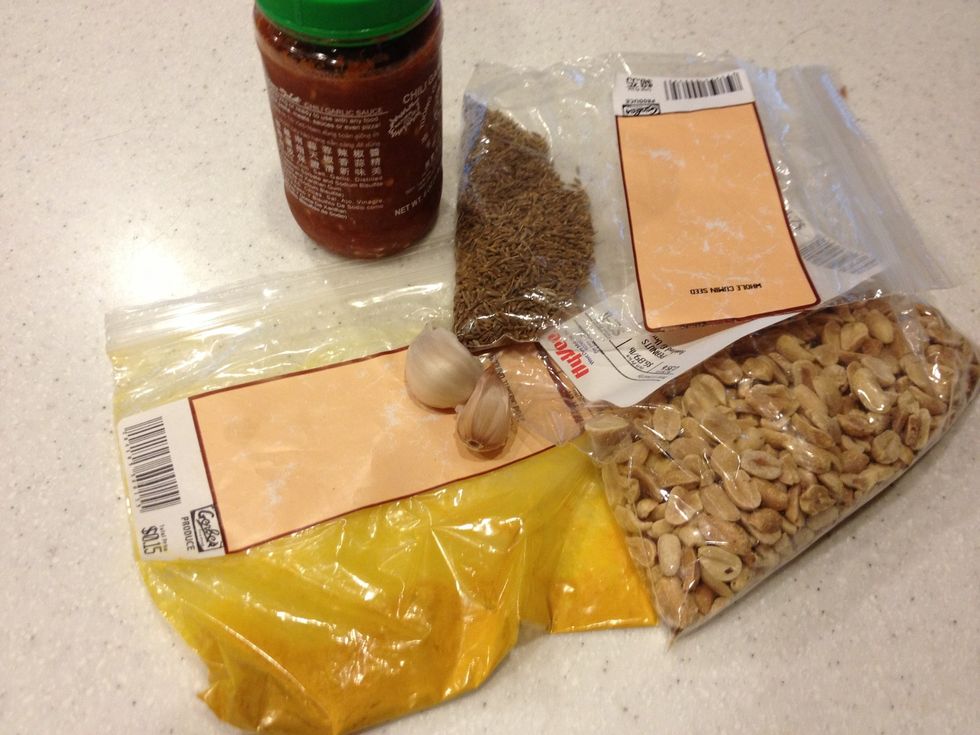 I threw together my own lazy curry by toasting cumin seeds while I saut\u00e9ed the garlic. I also added some dried chilies, but they are optional. I wait to add turmeric until I re-add the shrimp & vegs.