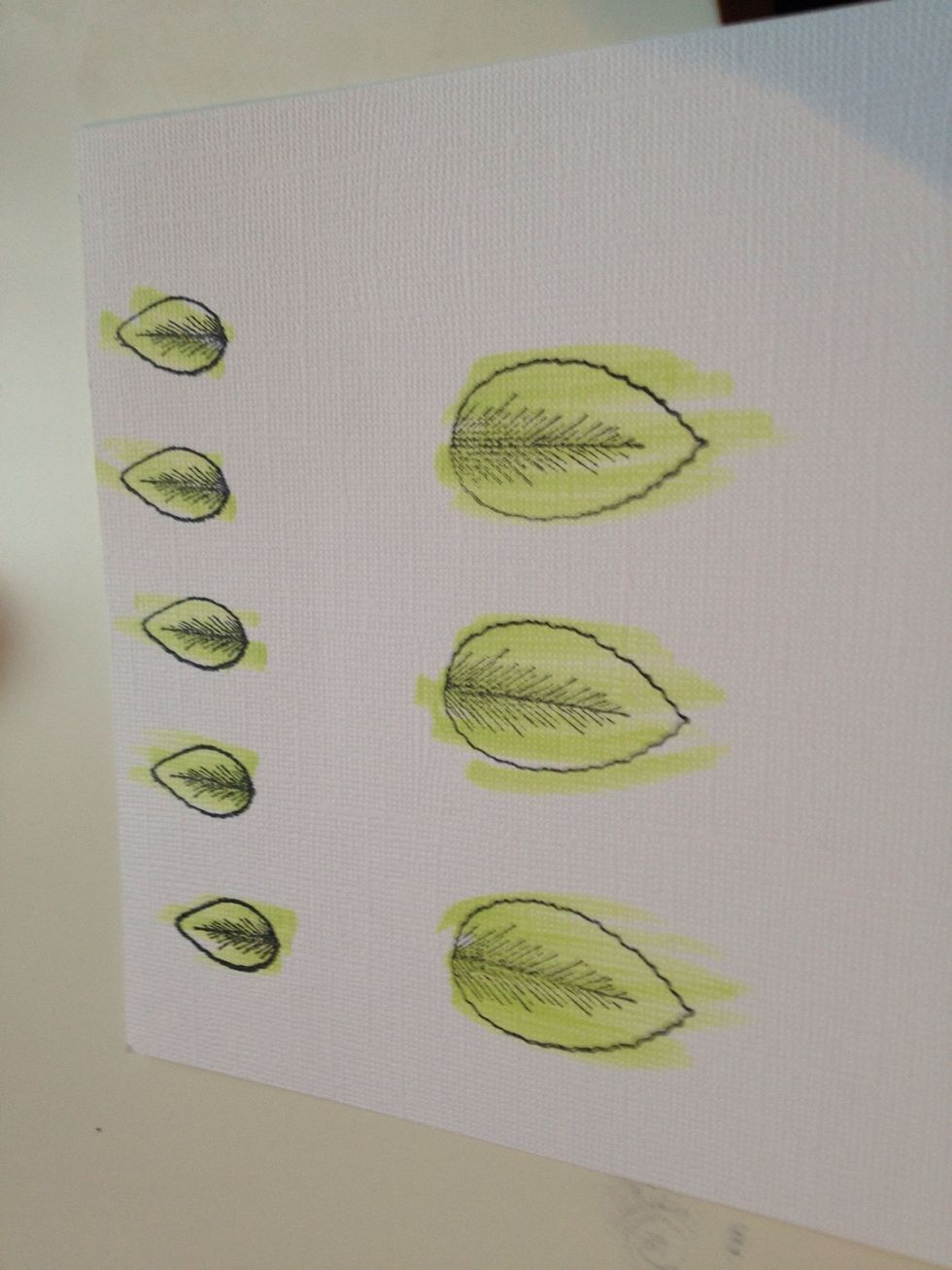 I took a different technique with the leaves - I colored them first. I didn't get as clean of a cut with the die on the large leaf - so the dampness of the paper may have impacted it. You can try both